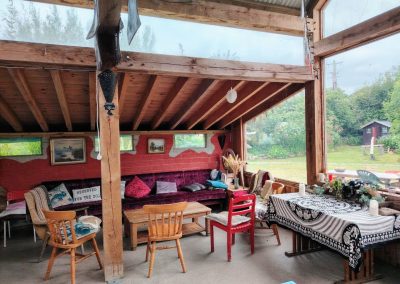 Cozy interior of a yurt at Inch Hideaway with wood-fired stove