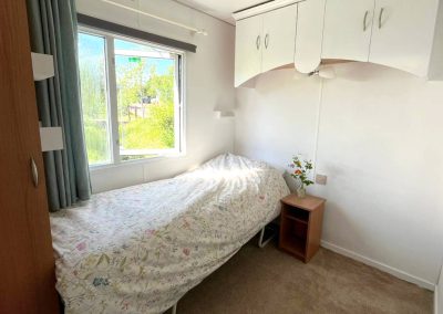 Interior of the Cara Van Haven with cozy furnishings and timber features