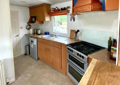 Sunny deck area of the Cara Van Haven overlooking the countryside